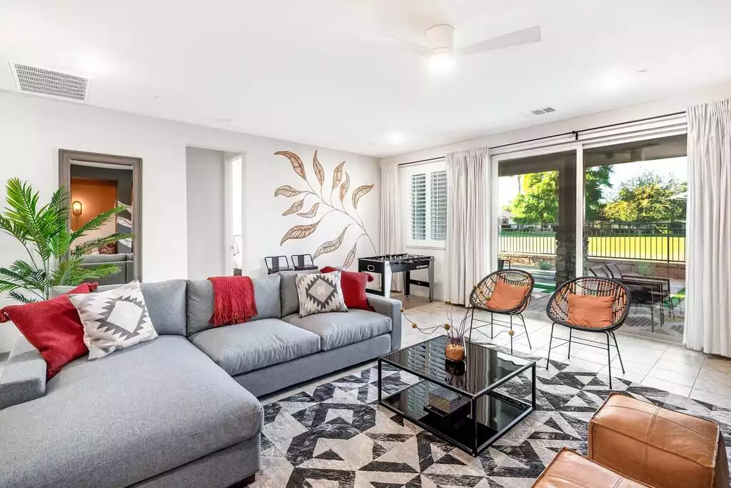 Hand-painted murals adorn both sides of the living room