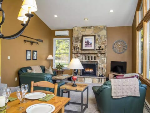 Dining room seats 6, leads to great room & cozy & convenient electric fireplace.