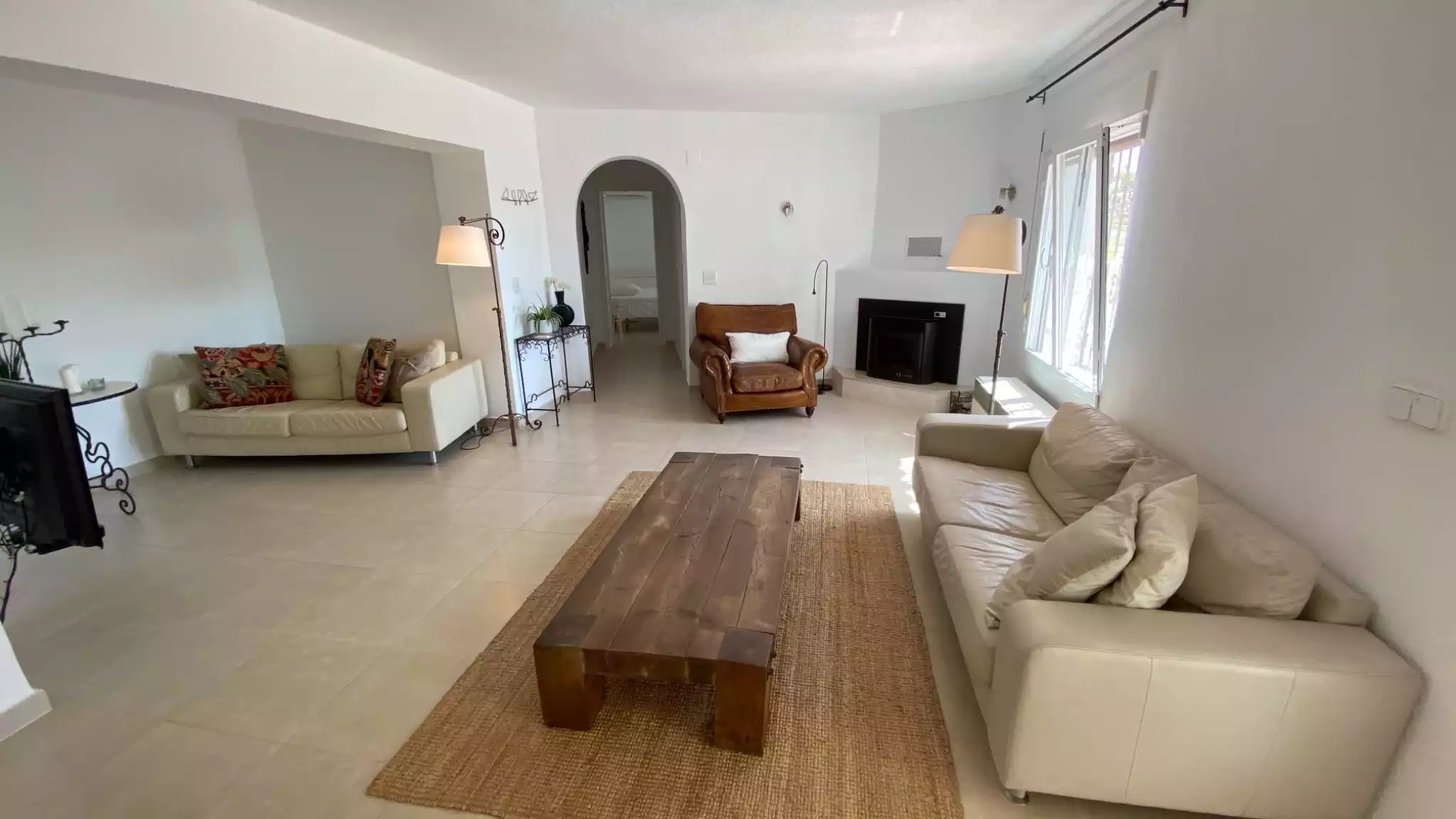 Second Floor lounge with aircon, flat screen tv and pellet stove