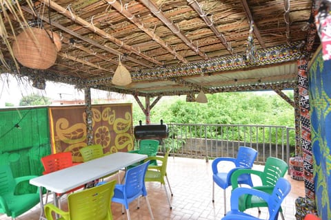 Possible access to our large terrace on the 1st floor with decorated straw hut, hammocks, garden furniture, and barbecue in complete privacy.