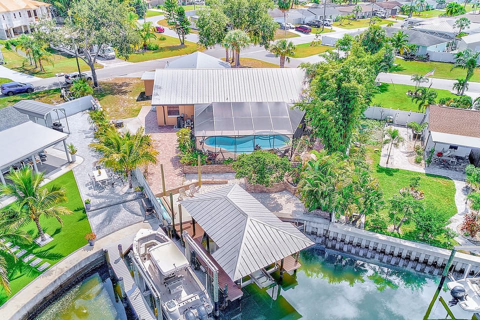 Enjoy the pool, sit in the sand and watch the sunset or fish from the dock!