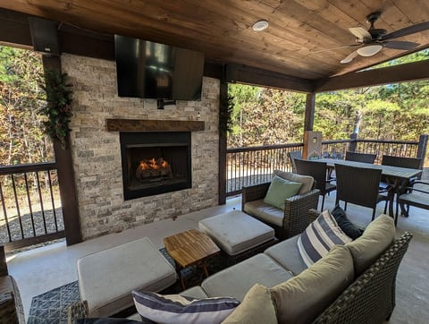 This is where you'll want to be. Soak up all of the fresh pine air while you sit by the fire or watch your favorite show.