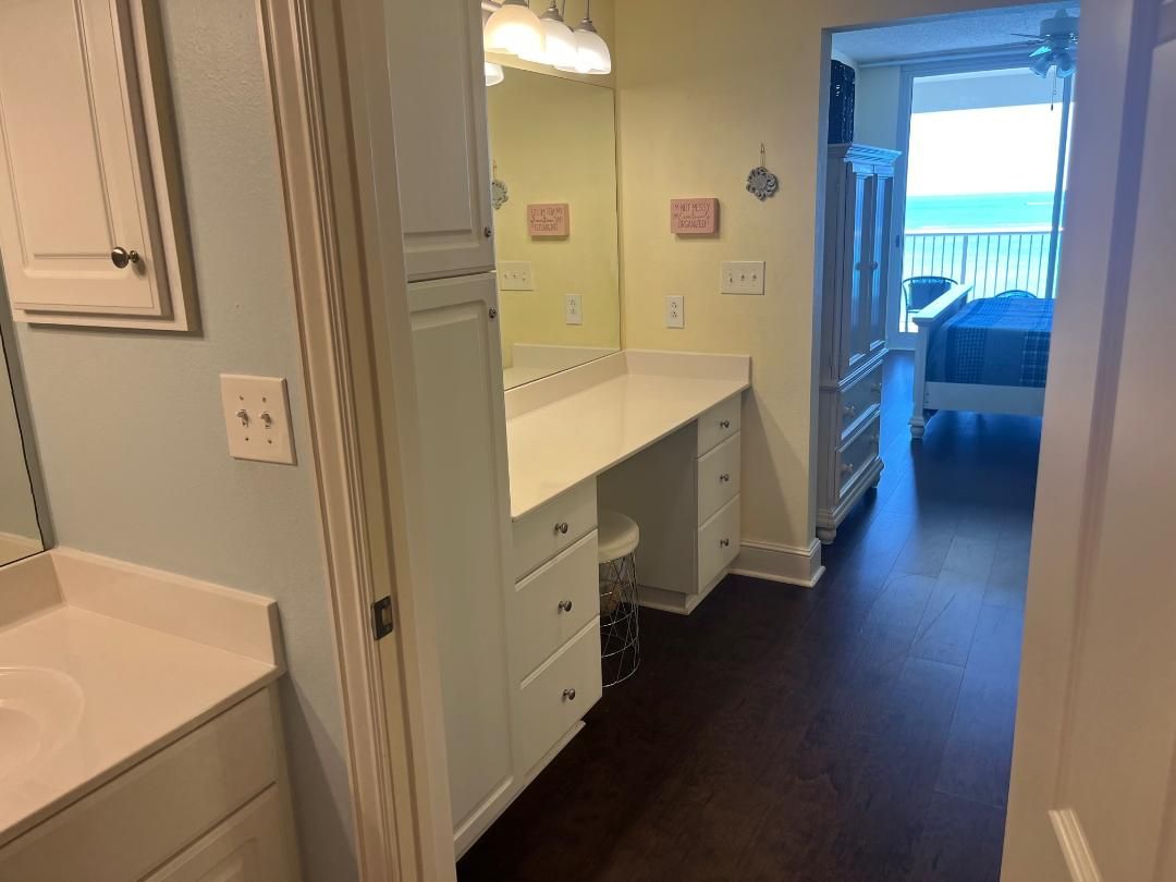 Makeup vanity and large master closet.