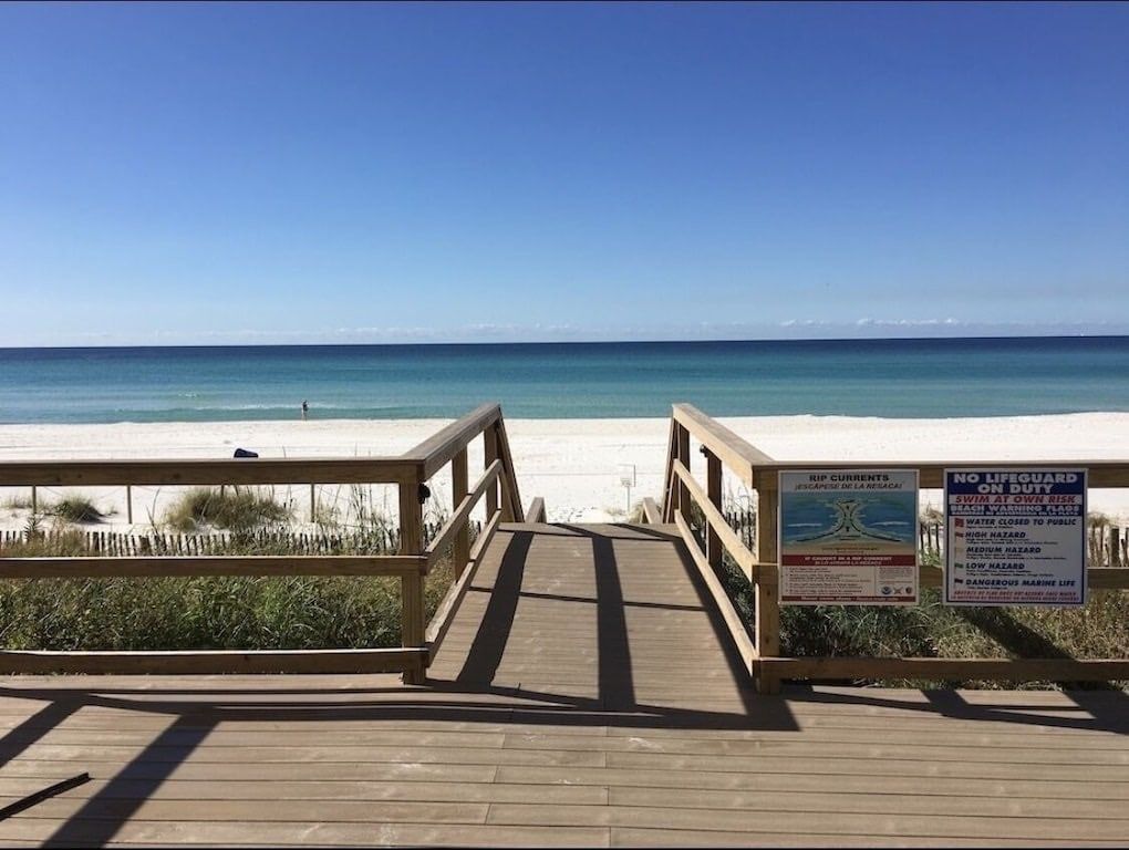 Direct beach access with stairs and a ramp.