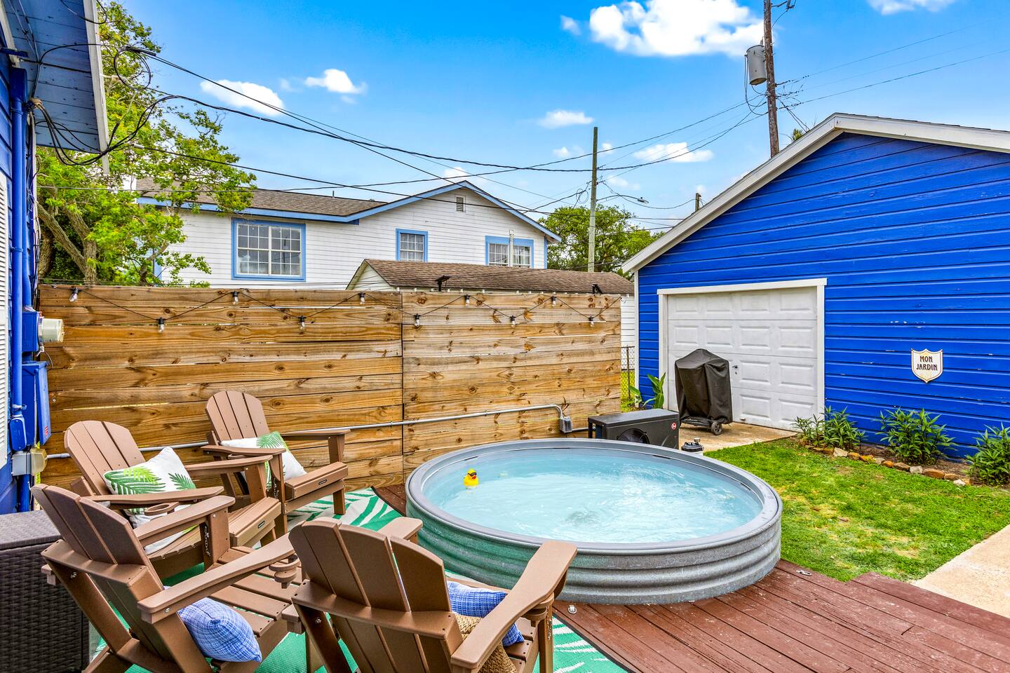 Hang out poolside in the relaxing adirondack chairs in privacy with the fence surrounding you and lights all around! The Cowboy pool can be heated in the colder months and nice and cool in the warm weather of the summer in Galveston!