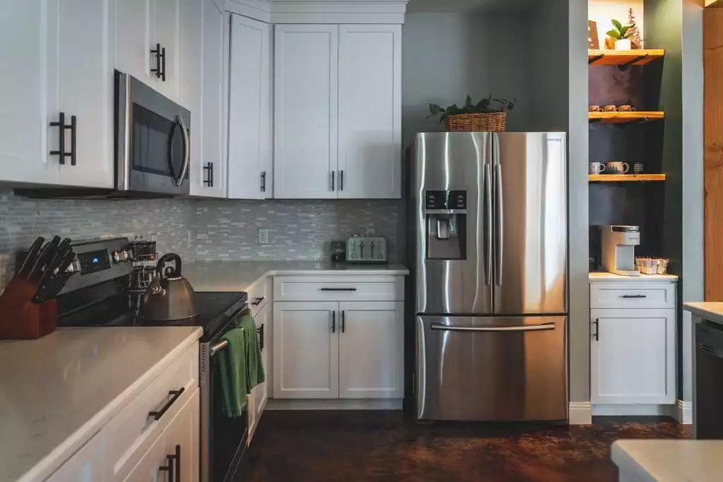 The open kitchen is at your disposal with full-sized stainless steel appliances and cooking supplies aplenty. - The Mt. Hood Manor - woodsy luxury by the river - Rhododendron