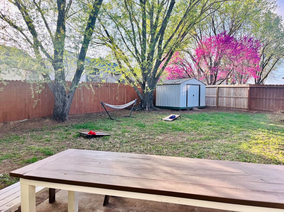 Plenty of seating to sit around and eat a meal after grilling out together! The backyard has a fire pit as well.