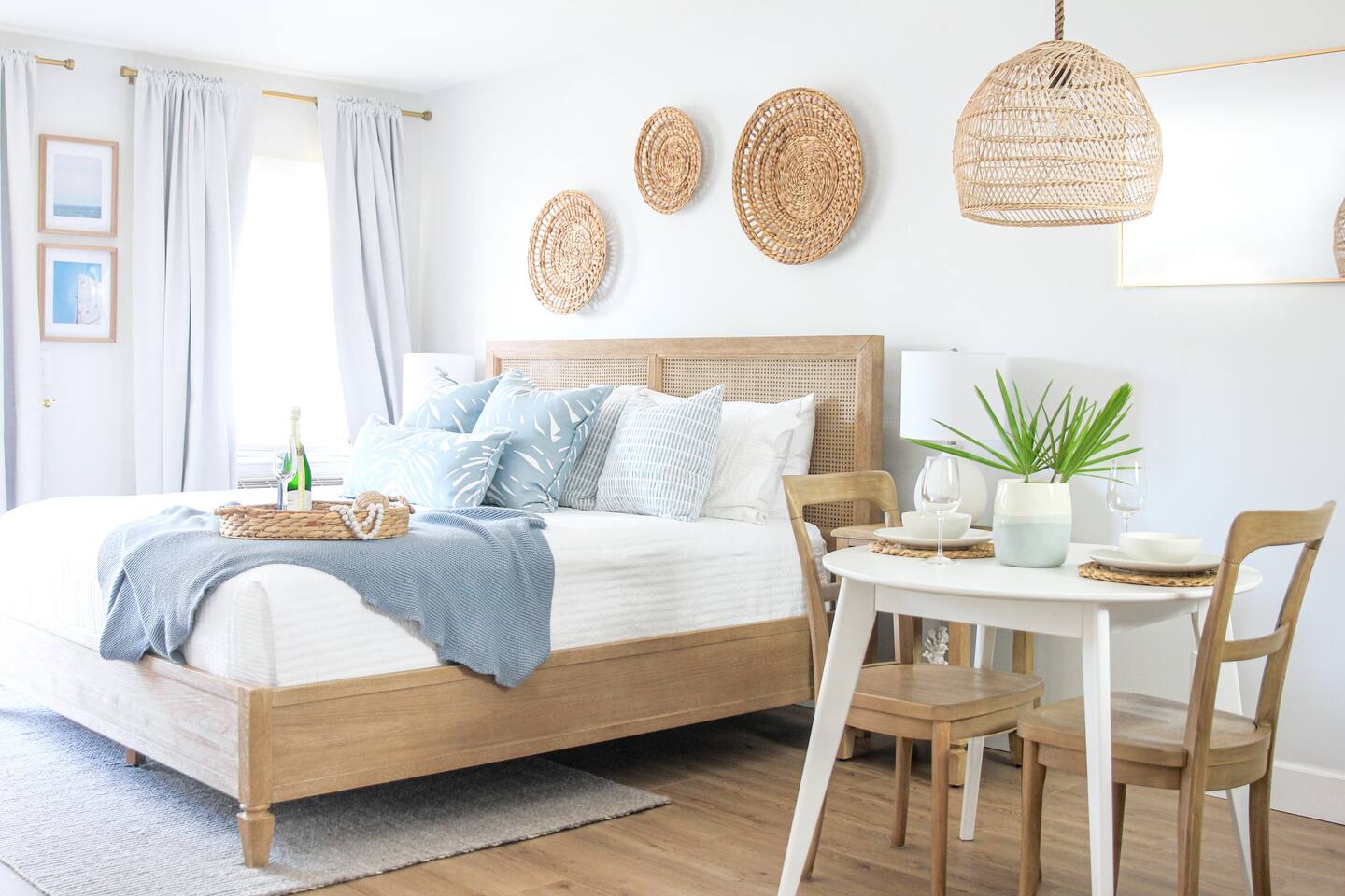 Experience serene coastal living at The Blue Palm. Relax in our luxurious KING bed, surrounded by soft, airy linens and tranquil decor. Perfectly designed for your ultimate comfort and peaceful retreat just steps from the beach.