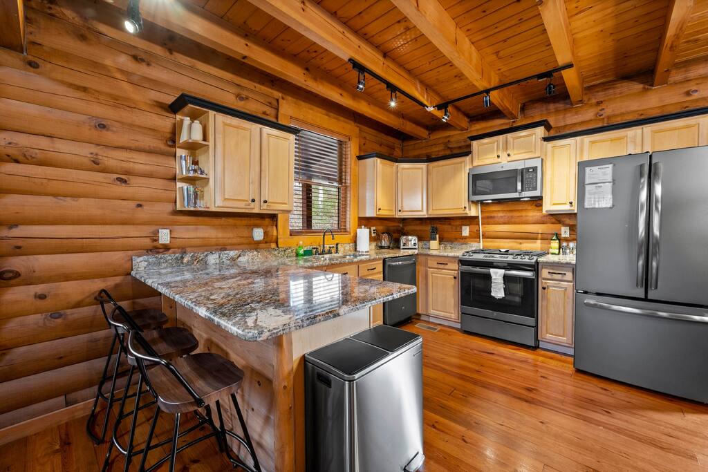 The kitchen is fully equipped and there is a cozy sitting area to relax in after a fun-filled day.