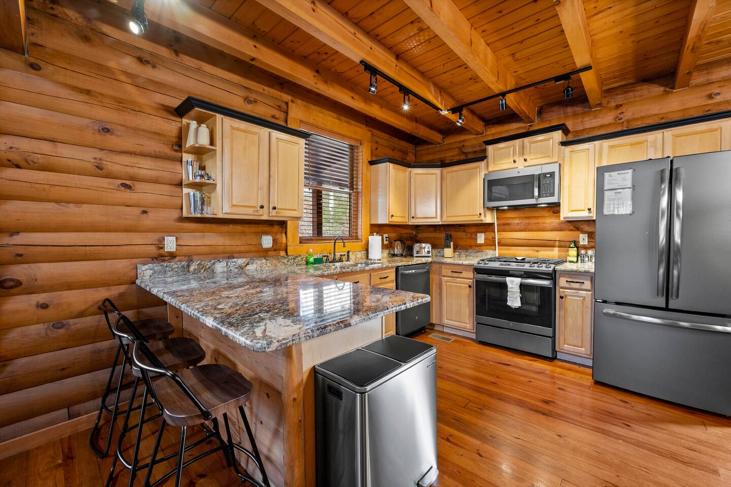 The kitchen is fully equipped and there is a cozy sitting area to relax in after a fun-filled day.