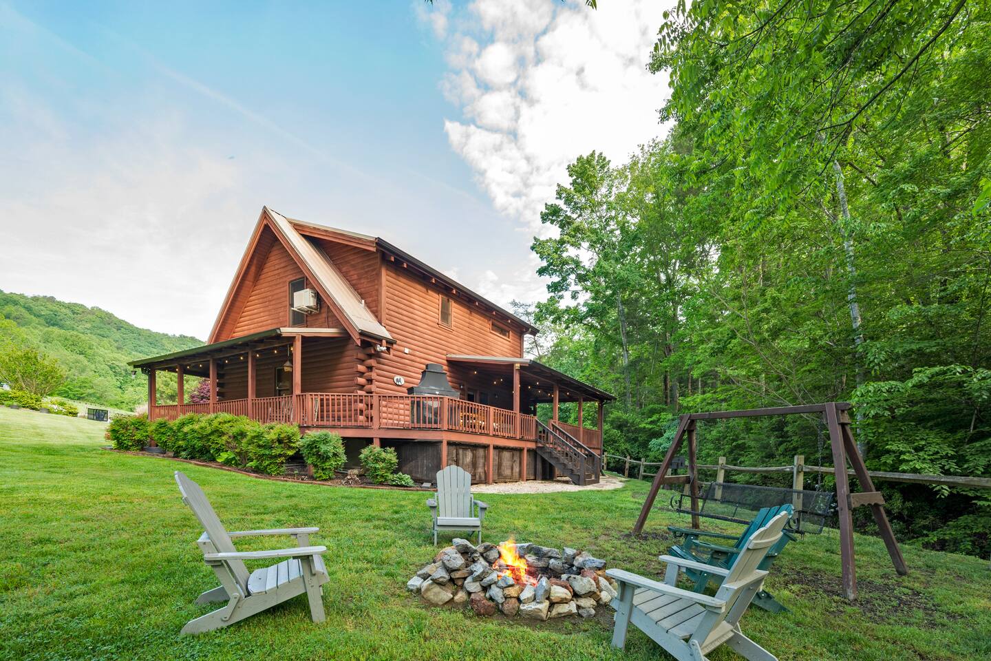 Hang out by the firepit and glaze the stars in the valley by the creek Creekside Log Cabin with Hot Tub