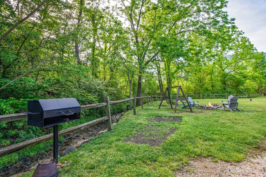 Coal grill for barbecue overseeing the spring water creek