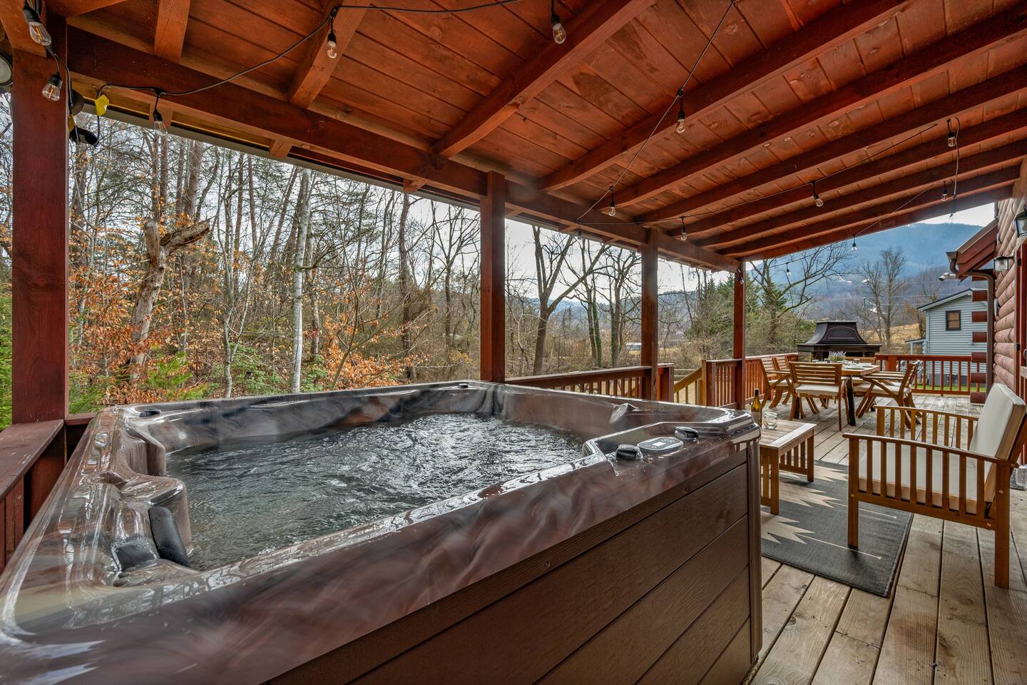 Relax in the hot tub and listen to the creek in the background Creekside Log Cabin with Hot Tub