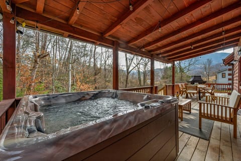 Relax in the hot tub and listen to the creek in the background