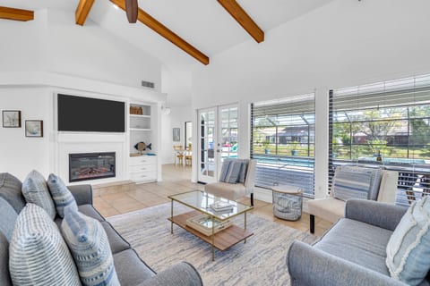 Guests love that the living room flows directly out to the pool and lanai!