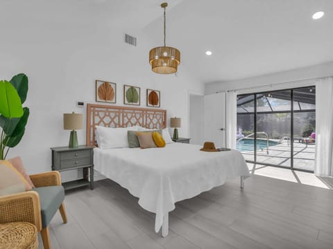 The primary bedroom flows right out to the pool!