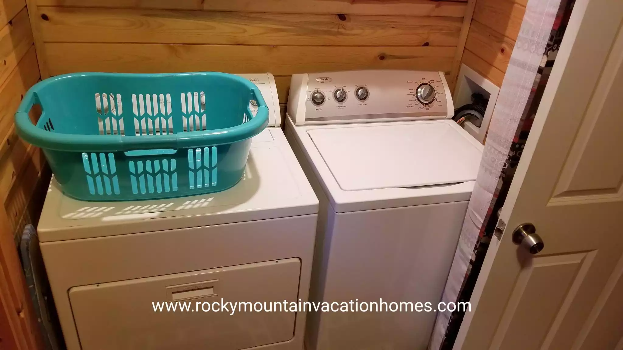 Laundry (washer and gas dryer) are located in the half bath. A curtain can conceal them.