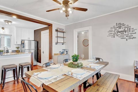 Dining Room with NEST thermostat on wall. Coffee/Tea station on right corner with Keurig machine and french press. Coffee  maker also available.