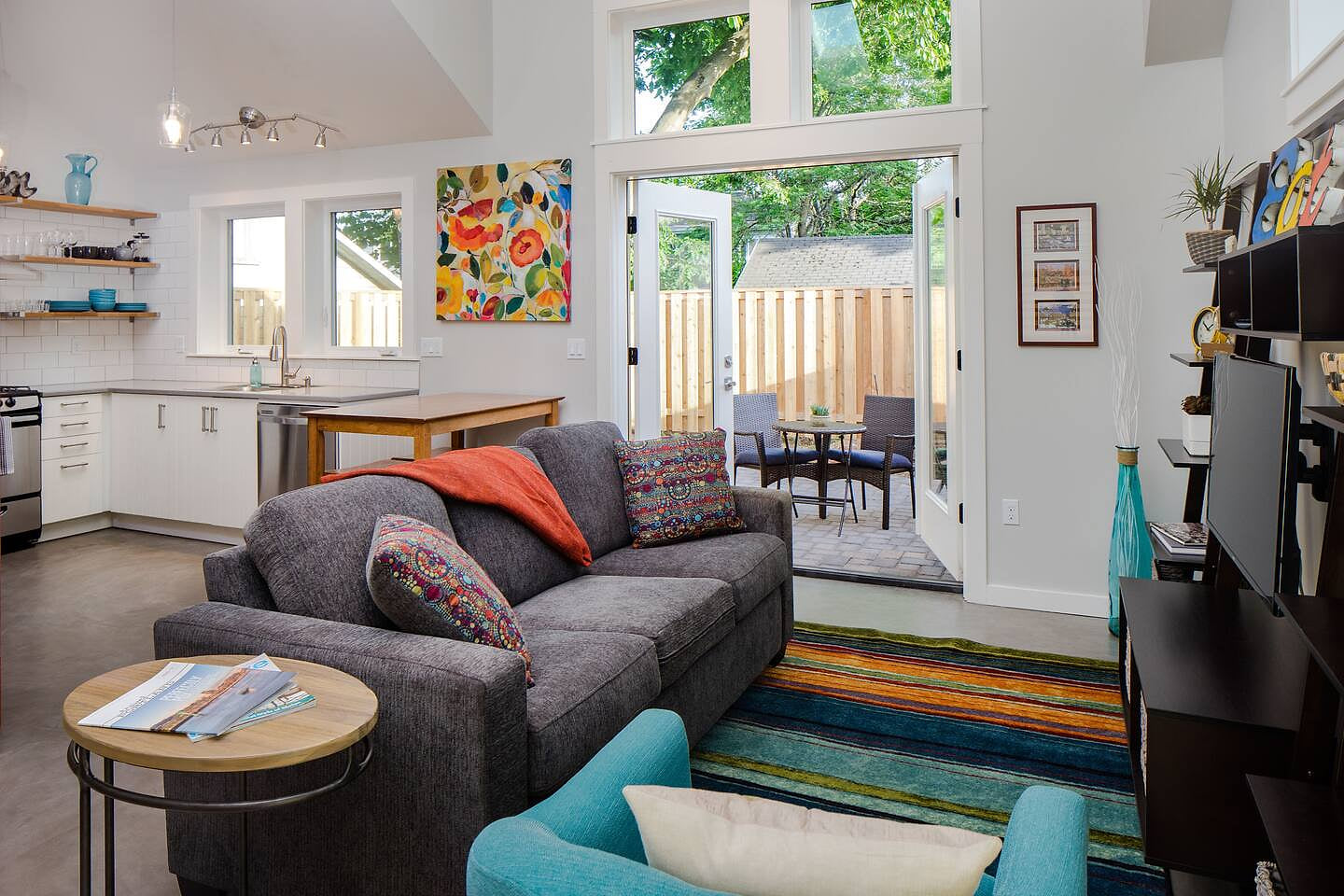 Welcome to the Alberta Nest! You’ll love the great natural light. Relax inside on the couch or outside in your fenced, semi-private courtyard