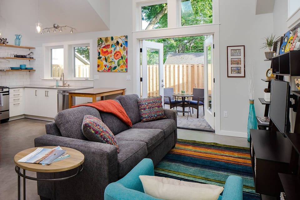 Welcome to the Alberta Nest! You’ll love the great natural light. Relax inside on the couch or outside in your fenced, semi-private courtyard