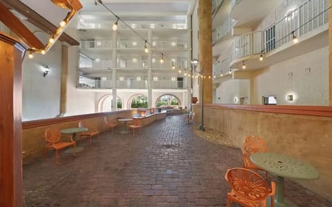Dining area just outside lobby next to pizza parlor