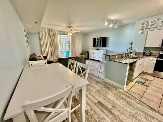 Enjoy a meal at the dining table, the bar, or take it out on the balcony