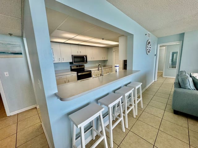 Enjoy meals at the bar in the spacious dining area
