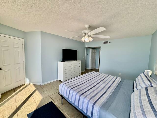 King bedroom has private access to the main balcony through door on the left