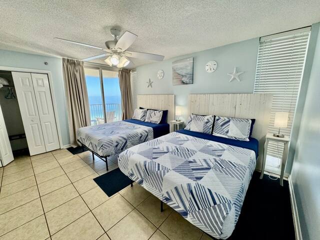 Wake up to epic views from your private balcony after a good night of sleep on the comfortable queen size mattresses