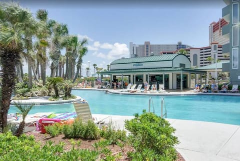 Grab some food and your favorite beverage at the Hangout next to the massive lagoon pool