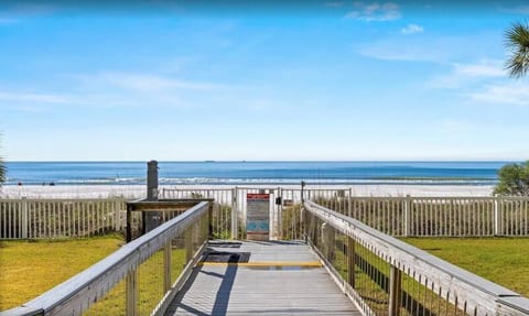Each of the four towers have beach access with a locked gate. A code is required to open