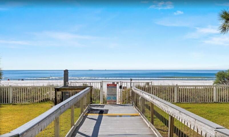 Each of the four towers have beach access with a locked gate. A code is required to open