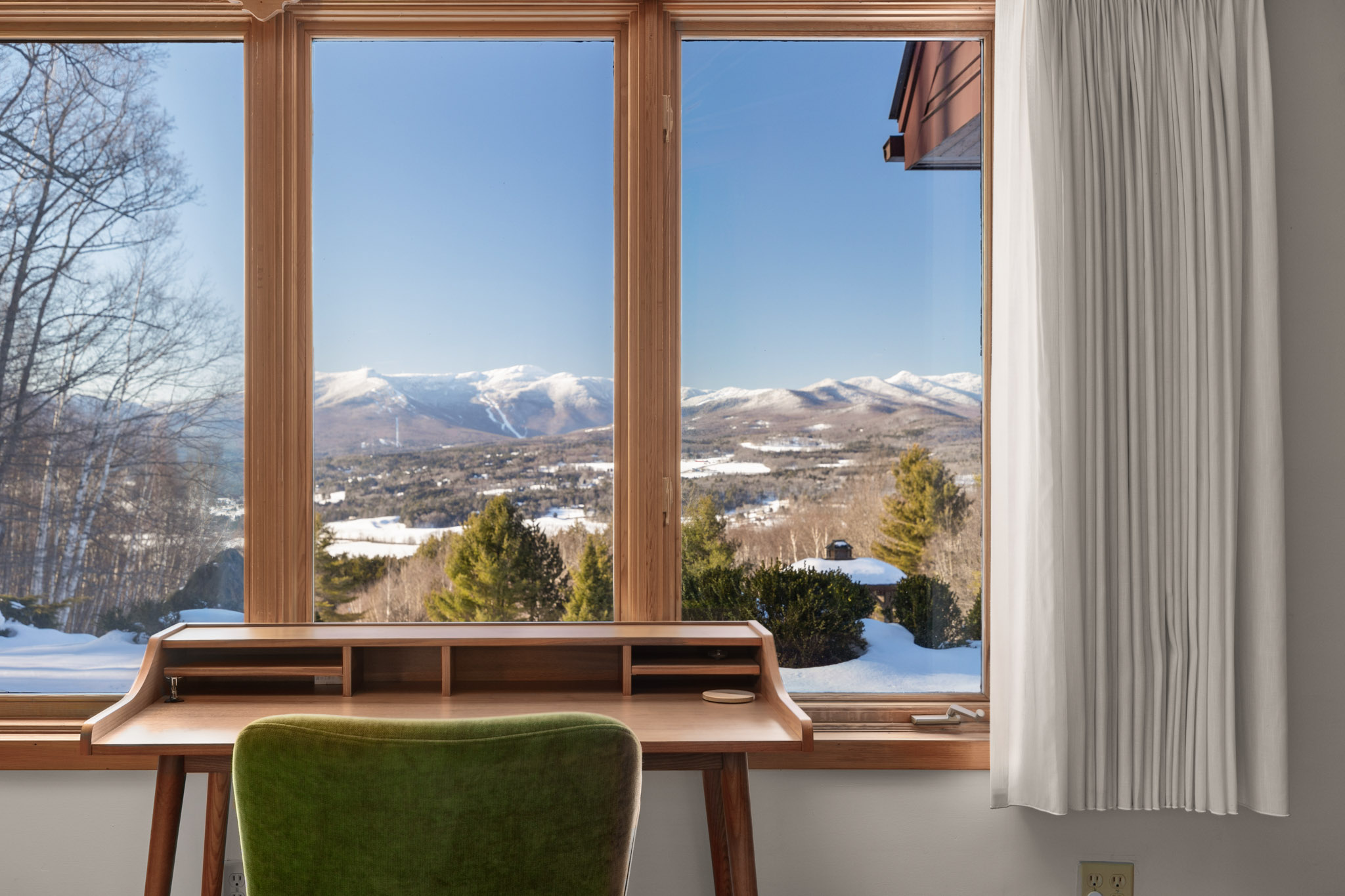 The downstairs office is a private, door-closed location to work remotely. The downstairs office is a private, door-closed location to work remotely. - Modern Retreat ~ Stunning Mountain View ~ Hot Tub! - Stowe