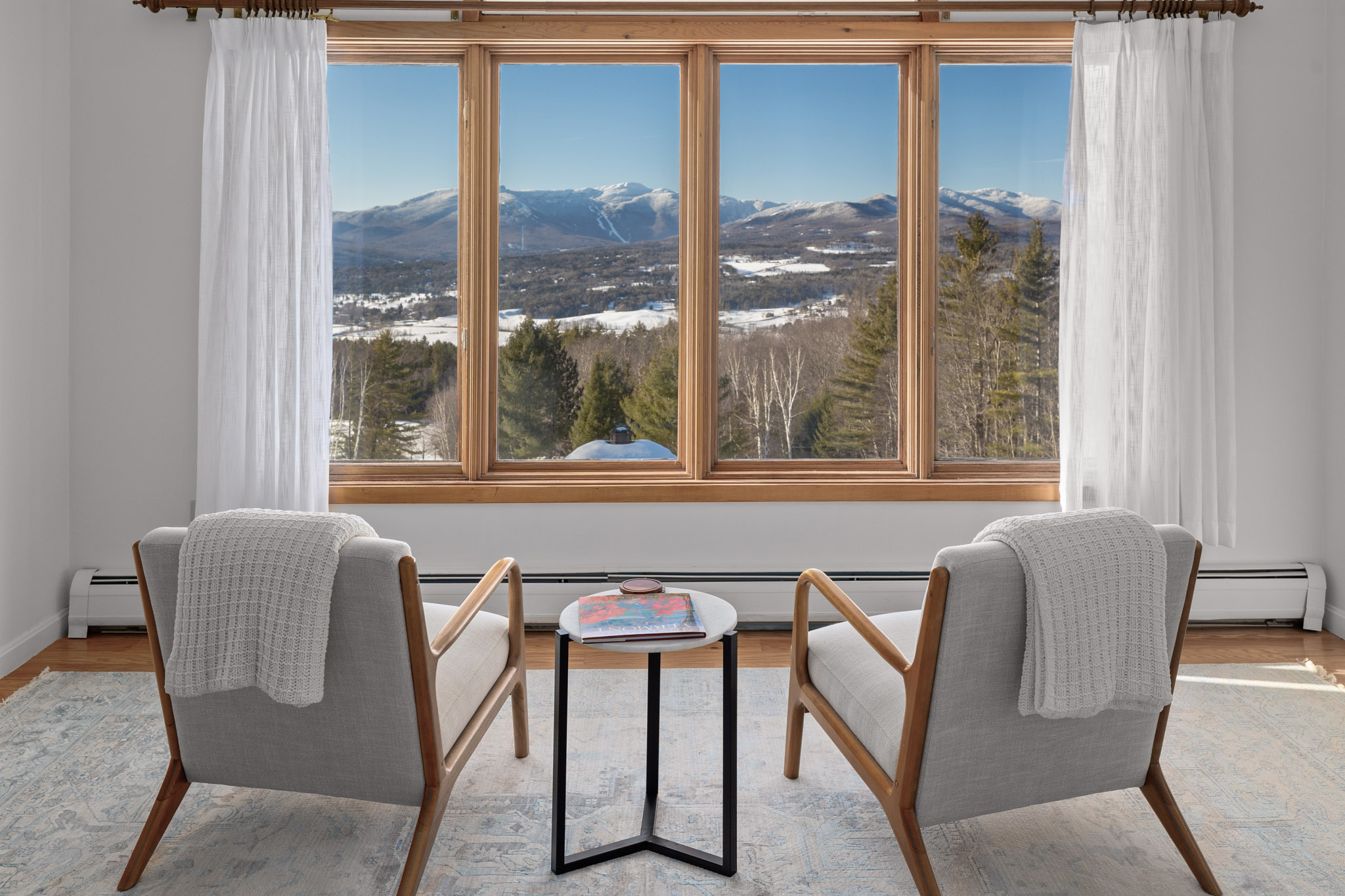 The master bedroom sitting area is perfect for watching sunsets. The master bedroom sitting area is perfect for watching sunsets. - Modern Retreat ~ Stunning Mountain View ~ Hot Tub! - Stowe