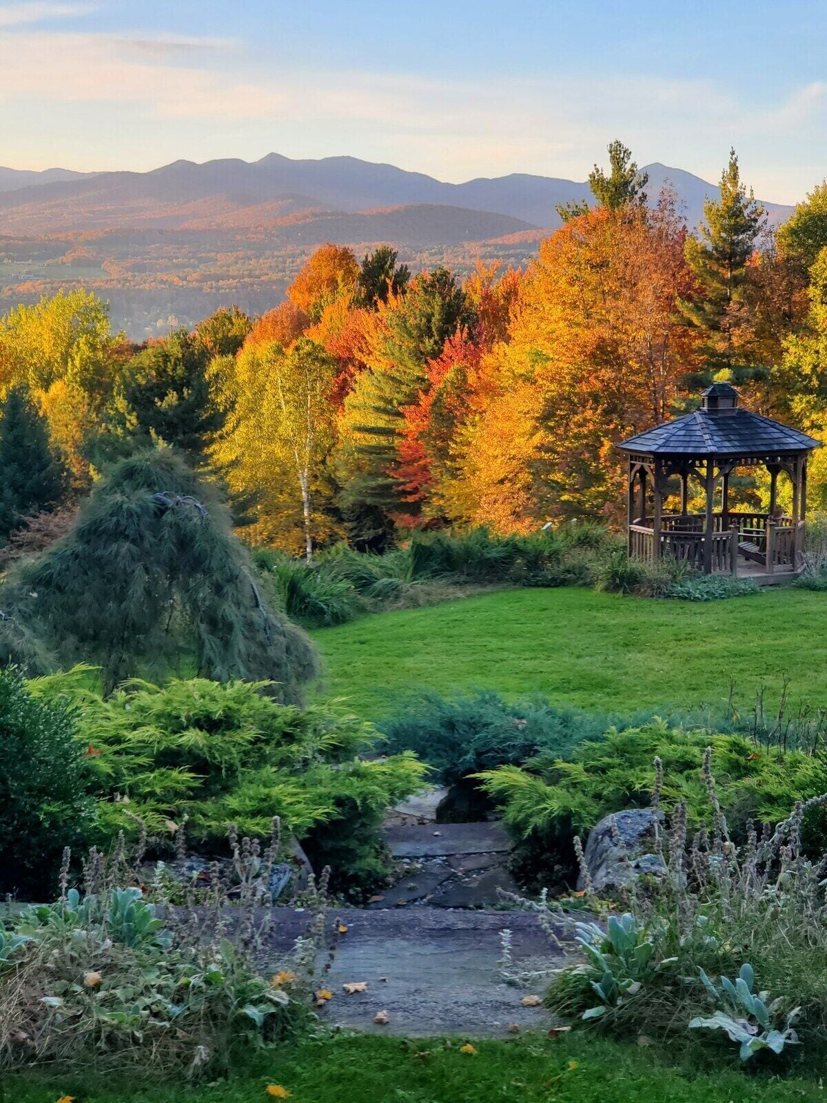 Peep leaves or watch kids sled down the hill from the gazebo. Peep leaves or watch kids sled down the hill from the gazebo. - Modern Retreat ~ Stunning Mountain View ~ Hot Tub! - Stowe