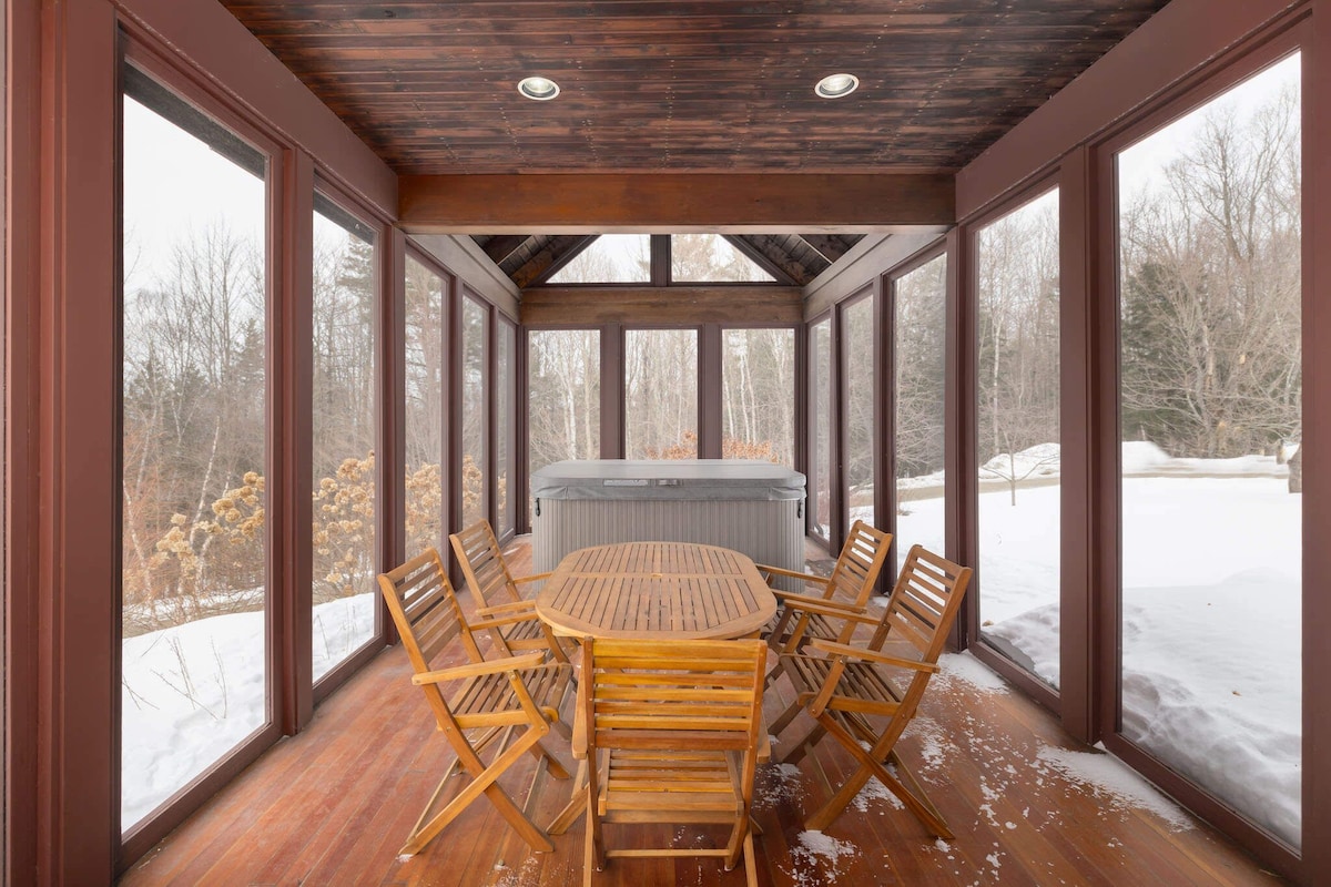 The veranda has a teak dining table with six teak chairs and hot tub. The veranda has a teak dining table with six teak chairs and hot tub. - Modern Retreat ~ Stunning Mountain View ~ Hot Tub! - Stowe
