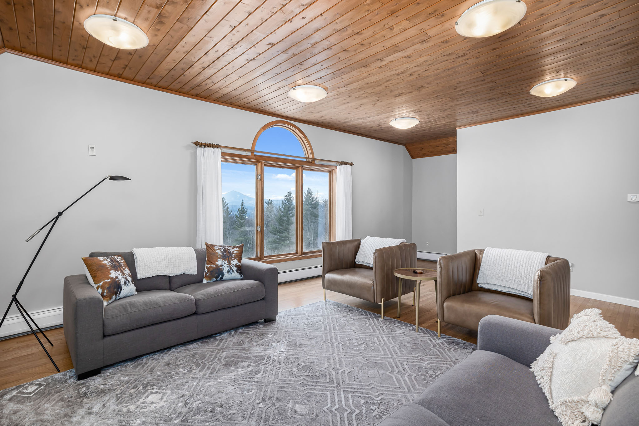 The upstairs bonus room is a perfect spot for kids and teens to hang out. The upstairs bonus room is a perfect spot for kids and teens to hang out. - Modern Retreat ~ Stunning Mountain View ~ Hot Tub! - Stowe