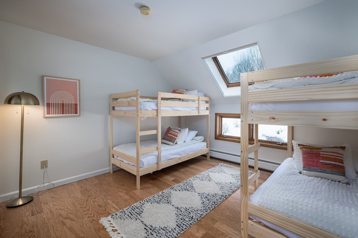 The bunk bedroom sleeps four total with two identical bunk beds. The bunk bedroom sleeps four total with two identical bunk beds. - Modern Retreat ~ Stunning Mountain View ~ Hot Tub! - Stowe