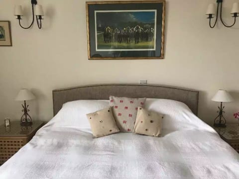 King bed made up as 'Austrian twins' Cosy downy duvets, pure cotton bedding.