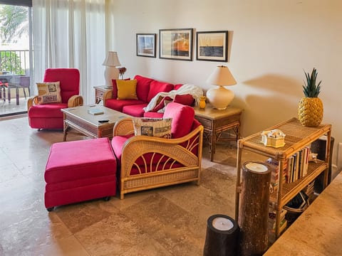 Relax inside in the colorful and comfy living room.