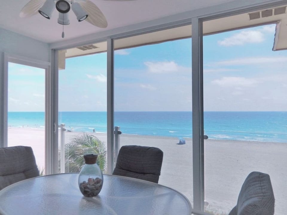Located directly on the beach! Morning coffee on the lanai overlooking Gulf and beach!