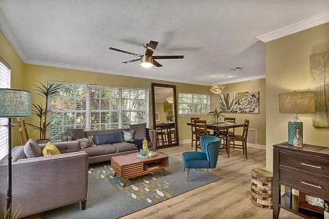 The entry and living room is a welcomed, friendly spot when arriving home. There is a 65" Haier Flatscreen TV with a Samsung sound system that can fill the room! Curl up with a book or watch your favorite shows in comfort.