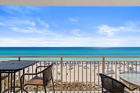 Emerald Perfection! This straight-on view from your private 5th-floor balcony is why it's a Guest Favorite. Watch the waves and the beach below from the best seat in the house. Your modern Gulf-front escape starts with this breathtaking view!