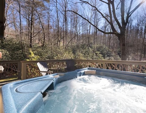 Privacy and lush views from the hot tub overlooking 2 acres of rhododendron forest. Listen to the sounds of the creek and star gaze at night while sitting in the hot tub.