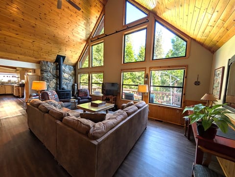 Pine paneling and trim brings the beauty of the mountains inside -- a great place to curl up and read a book!