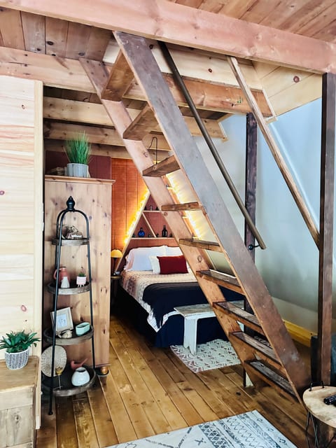 This bedroom behind the staircase is open to the living room. It’s best suited for guest with mobility issues.