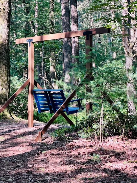 Our newest amenity swings creek side. Enjoy the sights and sounds of Mountain Creek while sipping on a glass of wine. 