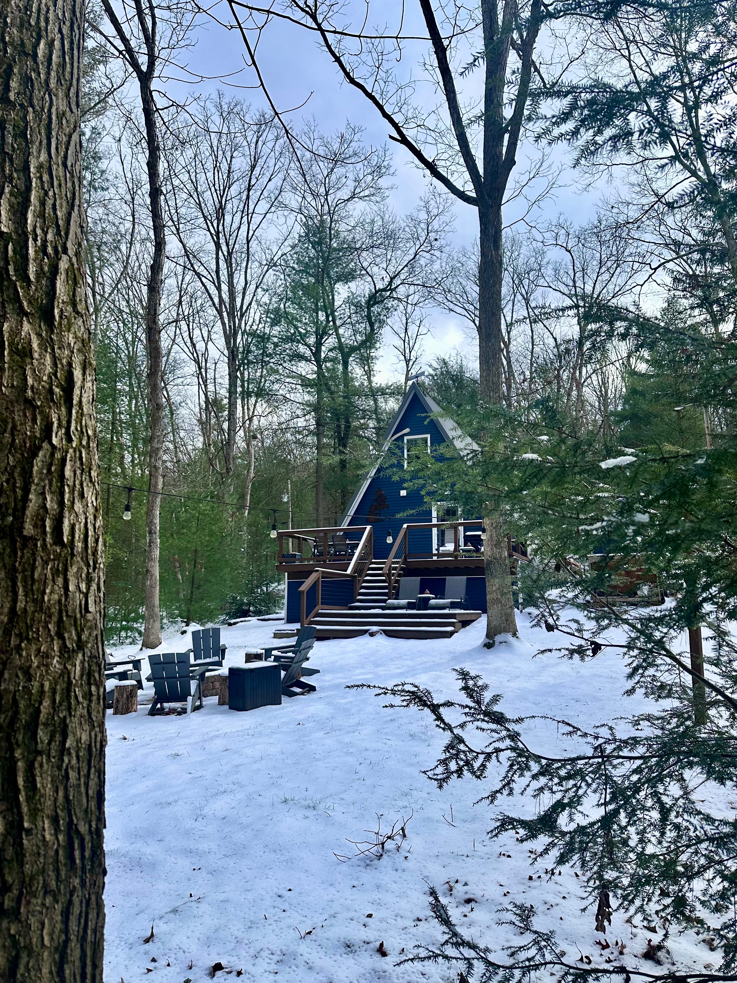 The backyard at Angled Pine is perfect for connecting with nature and loved ones.  Cozy Retreat A-Frame Cabin In the Woods Sleeps 6
