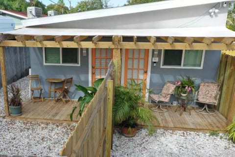 Exterior view of Studio East & Studio West. Each studio has private entrance and private yard, connected with a gate.