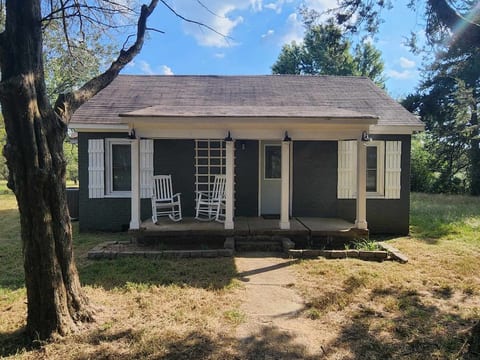 Front of the house with rocking chairs to sit and enjoy the gorgeous TN surroundings!